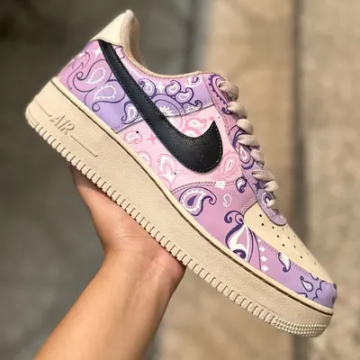 These are my coffee-dipped paisley Nike Dunks. I first dye the entire shoe in coffee to get that vintage, creamy base color, and then hand-paint the delicate paisley pattern in shades of lavender. The result is a soft, beautiful, and totally unique pair.