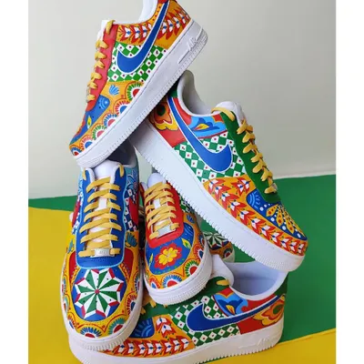 Here's a tower of my recent Truck Art inspired creations. I painted these Nike Air Force 1s for a client, each with different motifs but using a similar vibrant colour palette. It shows how you can have coordinated but unique pairs.