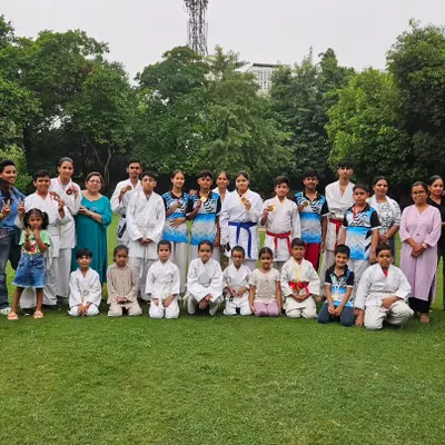 Our entire karate family, including students and their parents, after a successful event. The support of the family is our greatest strength.