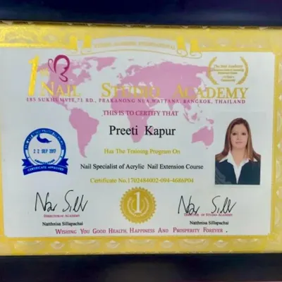 My official certification as a Nail Specialist in Acrylic Nail Extension from the prestigious Nail Studio Academy in Bangkok, Thailand.
