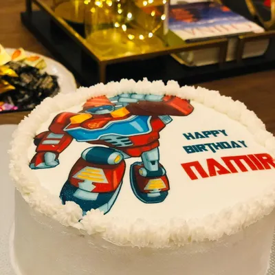 When the birthday boy has a specific request, I'm happy to deliver. This Optimus Prime cake features a detailed edible image of the Transformers hero, making it a perfect custom birthday cake for a fan.