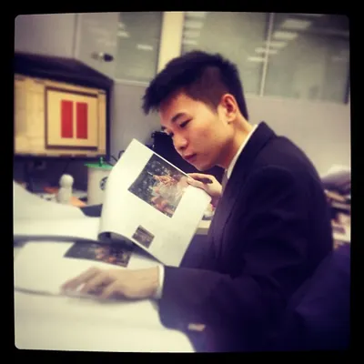 Here I am reviewing materials to ensure every detail aligns with the core message. This is the foundation of my personal branding and messaging strategy services, where I help entrepreneurs and brands build a genuine connection with their audience.