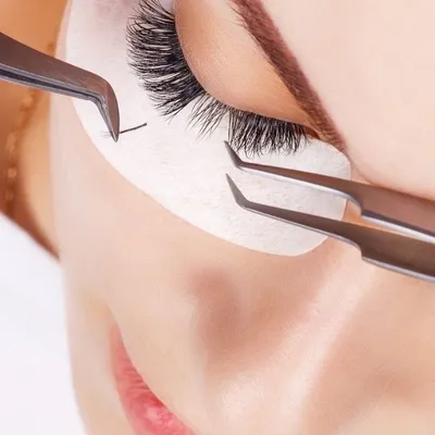 This is where the magic happens. Using specialized tools, I carefully place a single extension onto a single natural lash. This one to one application is key for achieving a full yet natural look that doesn't harm your own lashes.