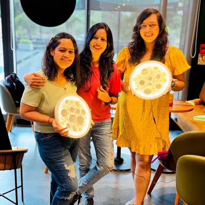 Three friends, three beautiful, glowing moon lamps. Each one is unique, reflecting the personality of its creator. A perfect girls' day out activity.