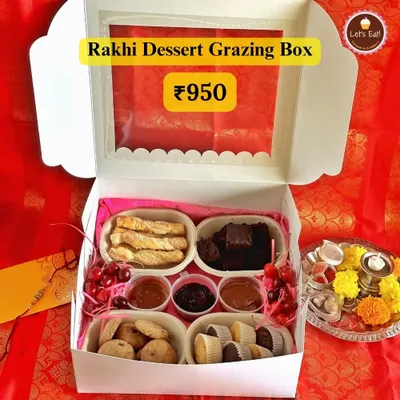 My Rakhi Dessert Grazing Box is perfect for sharing. It’s filled with an assortment of treats like palmiers, brownies, cookies, mini cupcakes, and three different dessert dips.