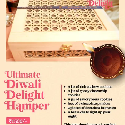 Our Ultimate Diwali Delight Hamper is perfect for indulgent gifting. It includes three kinds of cookies, decadent brownies, chocolate patakas, and a brass diya, all packed in a beautiful wooden box.