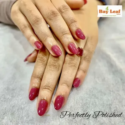 Sometimes, a single color is all you need for a perfectly polished look. Here are beautifully shaped almond nails with a flawless application of a rich, glossy magenta gel polish.