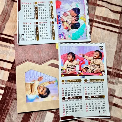 A look at some of the custom gifts included in my birthday packages. This includes personalized calendars and a beautifully designed photo album with a custom cover.