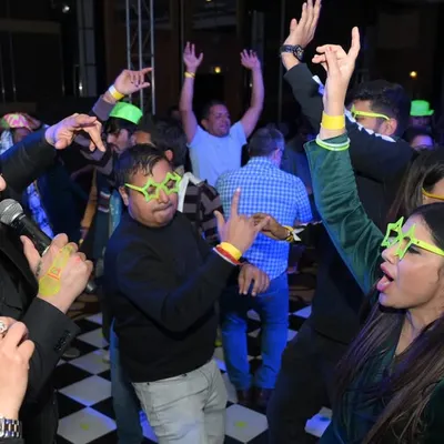 Capturing the pure, uninhibited energy of the crowd at a New Year's Eve party in Jaipur. My event photography focuses on these real, high-energy moments on the dance floor.