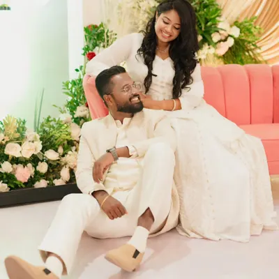 For Benoj and Mebin's engagement, we captured this sweet, candid moment. The simple, elegant decor with a pop of color from the pink sofa allowed their personalities and love for each other to be the main focus.