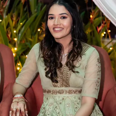 A simple yet elegant look for an engagement party. I created soft, natural-looking curls to complement her embroidered Anarkali, keeping the style effortless and chic.