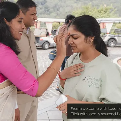 A warm, traditional welcome for guests arriving at a destination wedding. We greet everyone with a tilak and locally sourced flowers to make them feel special from the very first moment.