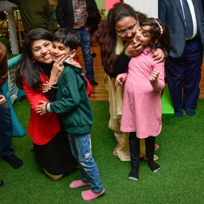 A cheek to cheek kind of day! I love seeing these sweet, candid moments of affection between parents and their children during our events.