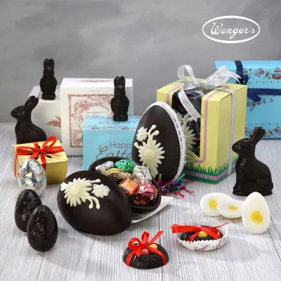 Our Easter collection is a festival of flavours and colours. This spread shows our handmade chocolate eggs filled with treats, adorable chocolate bunnies, and other special confections we create to make your Easter celebrations extra sweet.