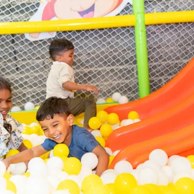 This is the kind of pure, unfiltered joy we love to see. Our ball pit is more than just a play area; it's a space for laughter, making new friends, and developing social skills through fun.