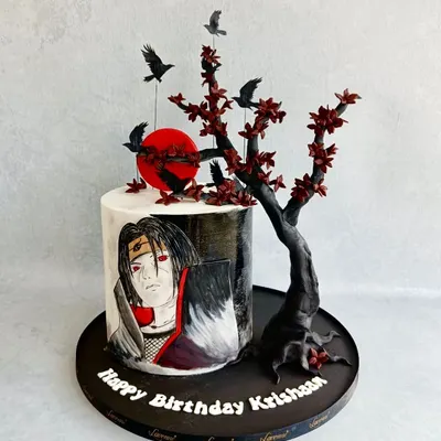 An Itachi Uchiha-themed cake for a true anime fan. This design features a hand-painted portrait of the character and a sculpted sugar tree with crows. The client shared a reference from another artist, and I hope we did it justice.