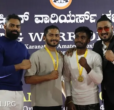 Celebrating with our champions after a successful night at the Boxing Warriors Club event. Seeing them with their medals makes all the hard work worth it.
