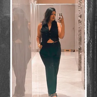 A powerful look for a powerful mood. I designed this all-black co-ord set, featuring a cropped waistcoat and tailored trousers, for a sharp, modern silhouette that is still comfortable. This is my take on contemporary formal wear.