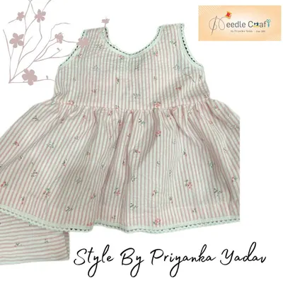 This simple and sweet striped cotton frock and pajama set is designed for ultimate comfort. The soft fabric and lace trim make it a lovely choice for daily wear or a good night's sleep.