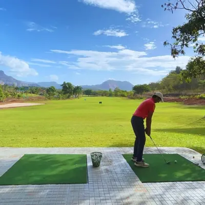 A beautiful day for practice at our driving range. The stunning mountain backdrop provides the perfect setting to work on your game.