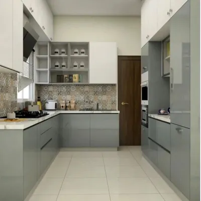 This U-shaped modular kitchen is designed for ultimate efficiency and style. It features sleek, high-gloss grey cabinets, a patterned tile backsplash for a touch of personality, and integrated appliances. The layout provides ample counter space and storage.