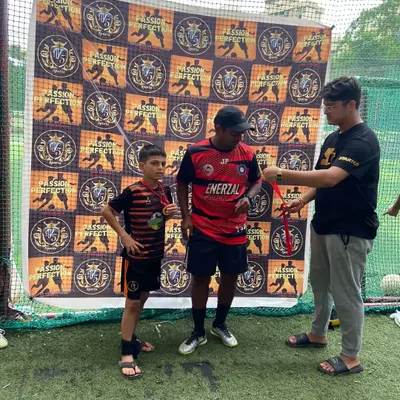 A player receiving an award at a tournament, showcasing our commitment to player development.