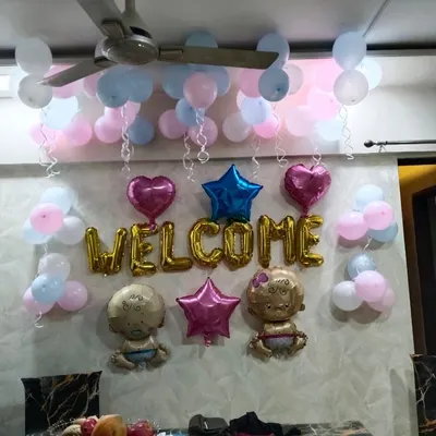 A classic "Welcome" balloon setup to greet a new baby. I used a mix of pink, blue, and white balloons, along with cute baby-shaped foils, perfect for welcoming either a boy or a girl.