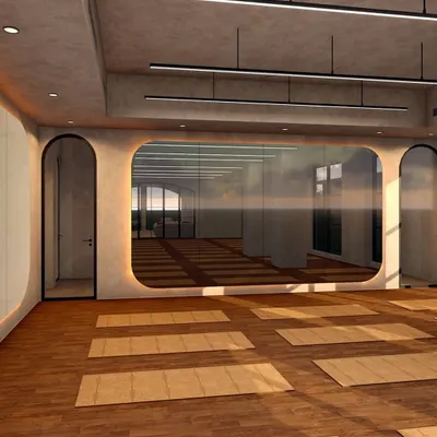 This is a view of the main yoga hall at Ignite + Aliign Studio, where I used a combination of raw, textured walls and warm wood flooring. The design features soft, rounded corners and recessed cove lighting to create a gentle, enveloping atmosphere.
