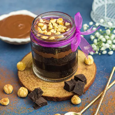 This is our signature Nutella jar cake, a true indulgence for any chocolate lover. It features layers of moist chocolate cake and rich Nutella frosting, topped with crunchy hazelnuts. It's one of our absolute bestsellers.