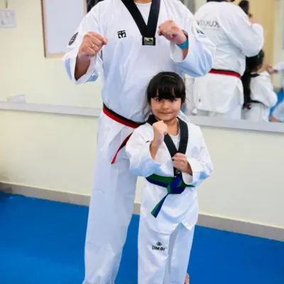 Taekwondo can be a family affair. A father and daughter duo, both training and growing together in our dojang.
