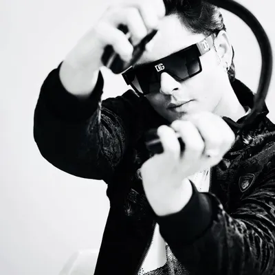 A black and white shot from a photoshoot. It's all about the music, and these wireless DJ headphones let me stay connected to the sound.