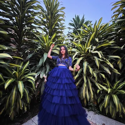 For me, fashion is part of the performance. This custom blue tiered gown is an example of the kind of look I bring to a formal evening gala or a grand celebration. I work with you to ensure my attire perfectly complements the theme and formality of your event.