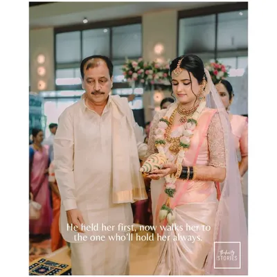 "He held her first, now walks her to the one who'll hold her always." A deeply emotional moment of a father walking his daughter down the aisle, a memory we are honored to preserve.