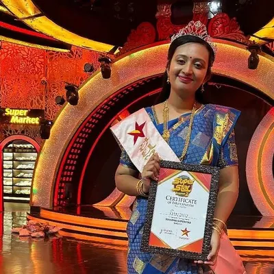 A proud moment for me, holding my certificate on the sets of the Suvarna Super Star show. This experience was a great validation of my culinary journey.
