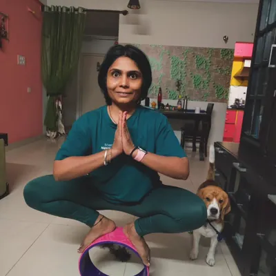 Balancing life, sometimes with a little help from my beagle. Here I am practicing my balance on a yoga wheel. It's a reminder that practice is a journey, not a destination.