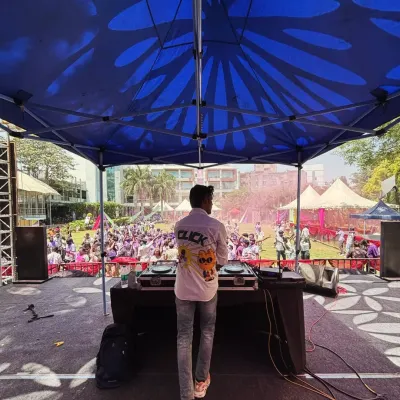 The hype for the UCB Holi festival was real. A view from my stage, looking out at the massive crowd ready for a day of music and color.