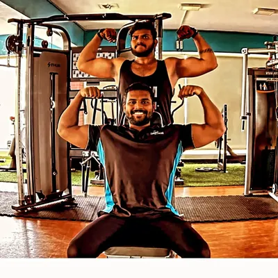 As trainers, we lead by example and celebrate our own strength. This is what the power of consistent training and dedication looks like.