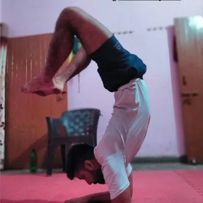 This is not just a yoga pose; it is a display of ultimate body control. The scorpion handstand builds the core and shoulder stability that gives our fighters an edge in grappling and striking.