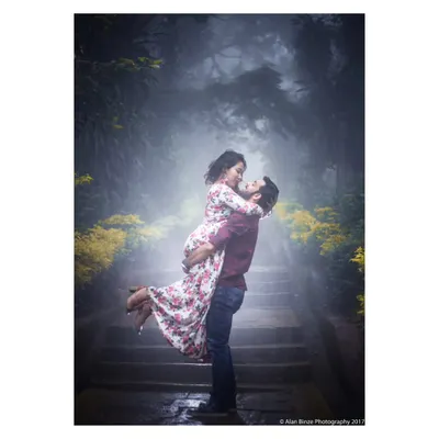 A signature atmospheric shot from a pre-wedding session at Nandi Hills. I lifted her up against the ethereal fog and light rays, creating a romantic, cinematic portrait.