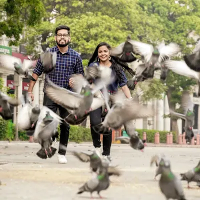 A candid, high-energy moment from a pre-wedding shoot in Connaught Place, Delhi. My city sessions focus on capturing your natural interactions against iconic urban backdrops.