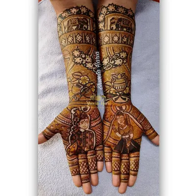 This full bridal mehendi tells a story, featuring portraits of the bride and groom, the gathbandhan ritual, and auspicious symbols like the kalash and elephants.