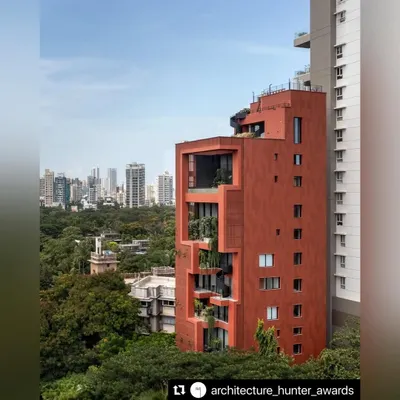 The award-winning Sarvasva tower stands as a testament to vertical living. We worked to integrate nature into its very fabric, creating a terracotta-clad structure that breathes amidst the concrete, with green spaces punctuating the facade.
