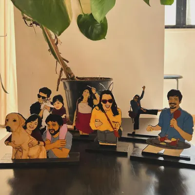 Here's a whole family of my custom wooden miniatures. I love creating these little scenes, capturing everything from family portraits with pets to fun, candid moments.