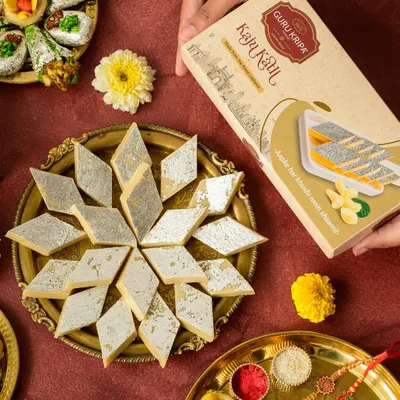 A beautiful flat lay from a Rakhi photoshoot, featuring traditional Kaju Katli and festive elements. We create visually rich compositions that capture the spirit of the occasion.