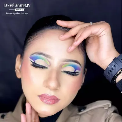 A stunning glam look created during one of our makeup classes. This features a colorful graphic eyeliner, demonstrating how to incorporate bold colors into a wearable, modern style.