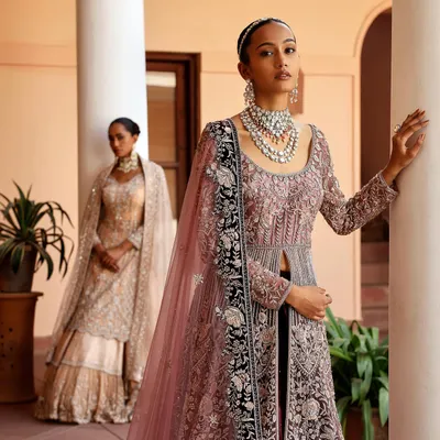 A key look from a campaign I styled, focusing on layered, opulent occasion wear. The combination of a blush pink embroidered jacket over a lehenga creates a regal look ideal for a bride or her family.