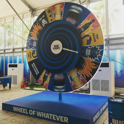 We go beyond digital with large-scale physical activations like this giant "Wheel of Whatever" for Bud Light. This custom-built, fully branded prize wheel adds a classic, tactile element of chance and excitement to product launches and promotional events.