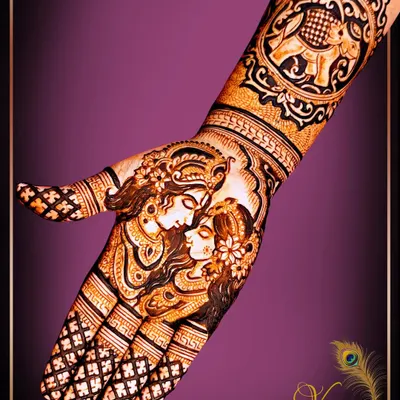 This design features a beautiful Radha Krishna portrait on the palm, complemented by a royal elephant on the wrist. I teach how to combine divine figures with other traditional motifs for a rich, layered look.