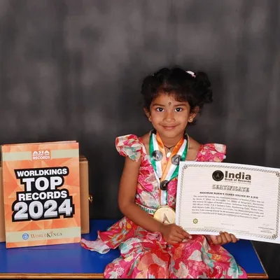 We are so proud of Aarna N, who holds records in both the Indian and Asia Book of Records for being the youngest to solve 53 types of Rubik's Cubes.