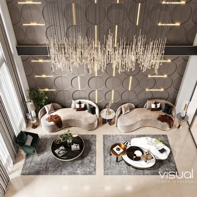 An aerial view of the duplex living room, showcasing the spacious layout, furniture arrangement, and the impressive scale of the crystal chandelier from above.